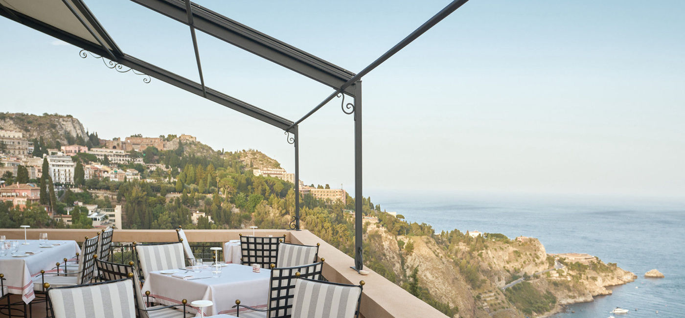 Image: The terrace restaurant Anchiovi at San Domenico Palace, Taormina, A Four Seasons Resort in Sicily, Italy. (photo courtesy of Four Seasons)