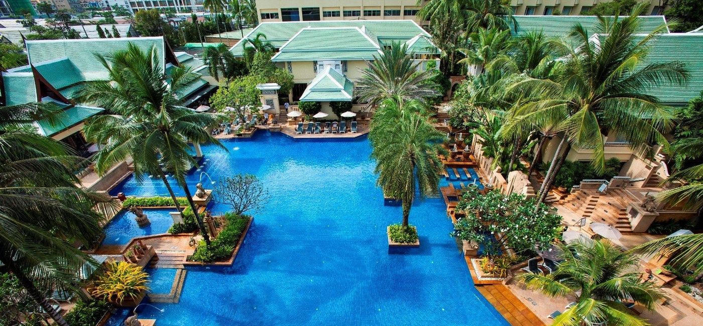 Image: PHOTO: The Main Pool at the newly renovated Busakorn Wing of the Holiday Inn, Phuket, where tropical sophistication meets traditional Thai luxury. (Photo courtesy of Holiday Inn Resort Phuket)