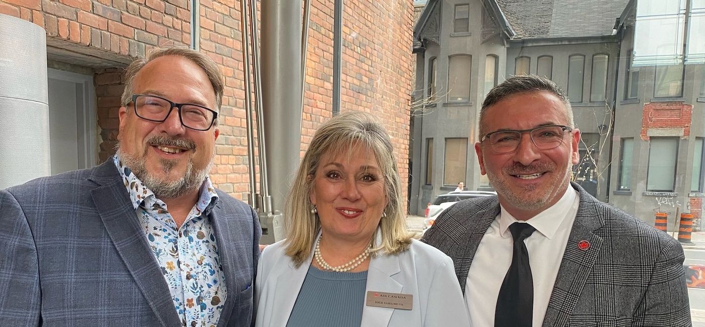 Image: Air Canada's EVP & Chief Commercial Officer Lucie Guillemette is flanked by TravelPulse Canada's Bruce Parkinson and Air Canada Vacations VP Nino Montagnese. (Bruce Parkinson)