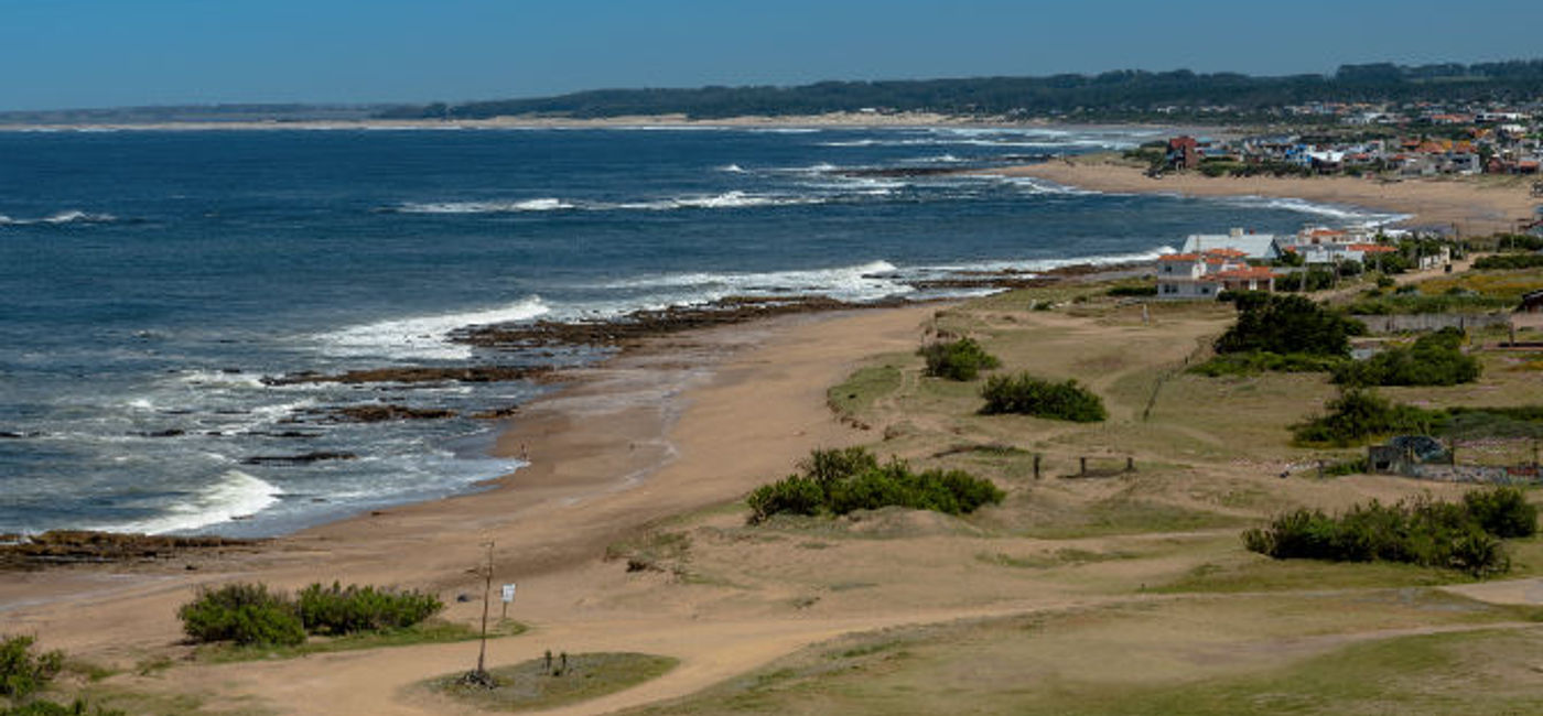 Image: The beaches of Uruguay invite visitors to rest and enjoy them with their families. (Photo via MarcosMartinezSanchez/iStock/Getty Images Plus).