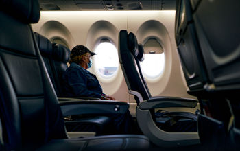 face mask on plane