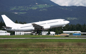 An unmarked Boeing 737 Classic.