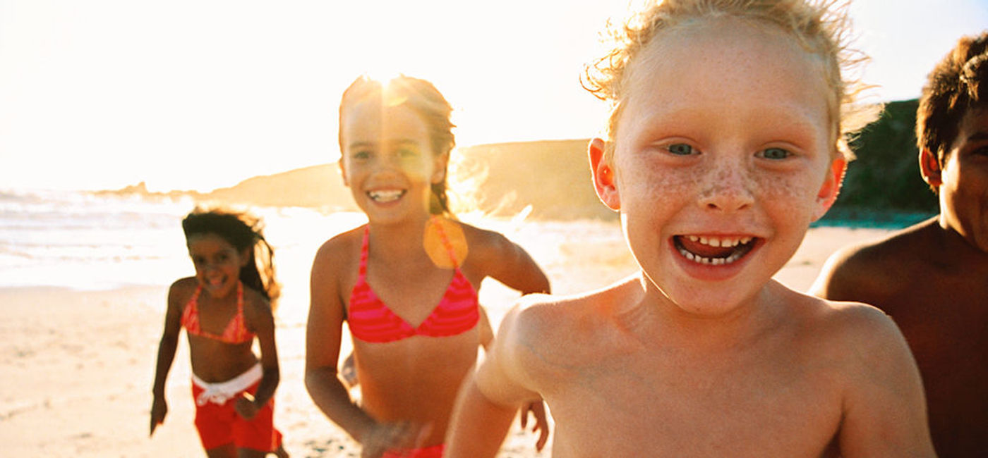 Image: PHOTO: Children running on the beach. (photo courtesy of Thinkstock)