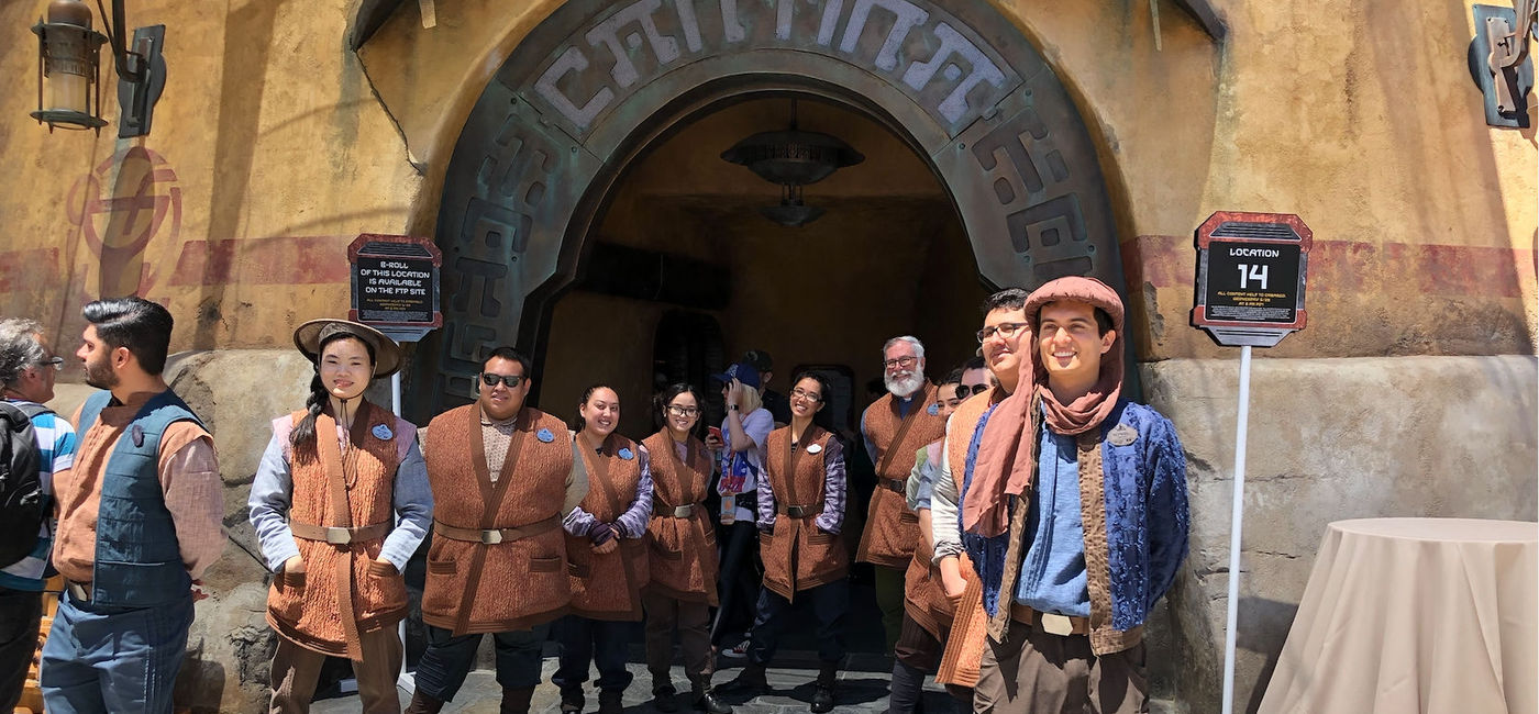 Image: Cast members line up outside Oga's Cantina at Star Wars: Galaxy's Edge in Disneyland (Photo via Brooke Geiger McDonald)