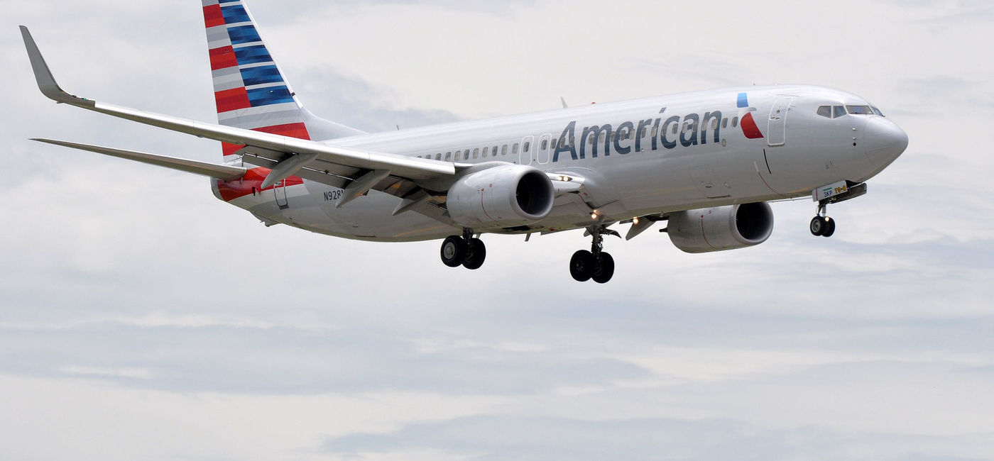 Image: PHOTO: American Airlines plane in flight. (photo via Flickr/Eric Salard)
