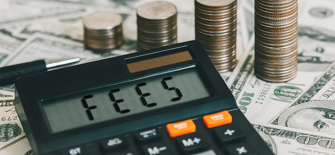 Image: Extra fees are often tacked onto the advertised price of short-term stays. (Photo Credit: iStock/Getty Images Plus/WANAN YOSSINGKUM)