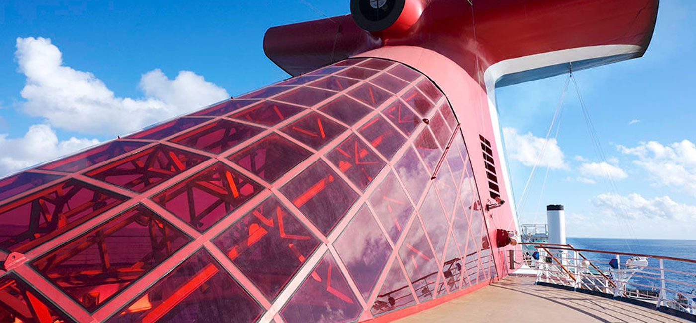 Image: PHOTO: The translucent red skylight glass of Carnival's Spirit-class ships emerged from the Pinnacle Project. (photo by Jason Leppert)