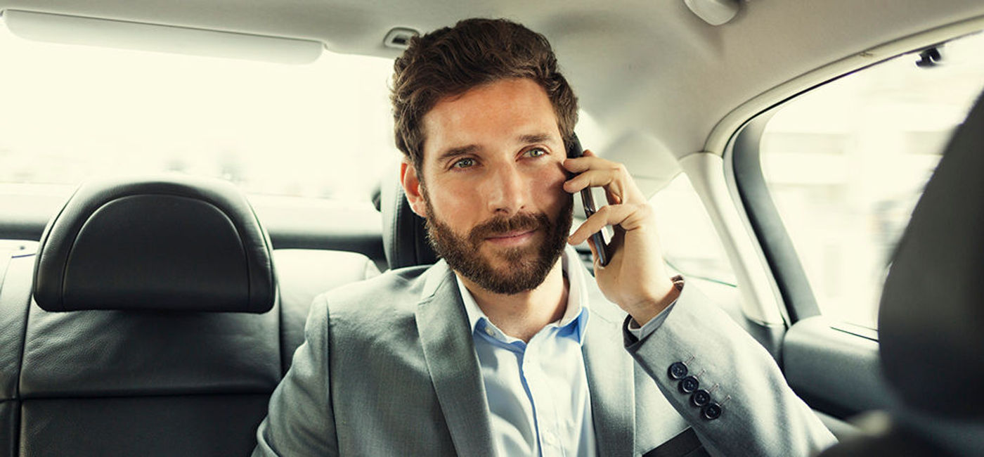 Image: PHOTO: A business traveler on the move. (photo courtesy of Thinkstock)