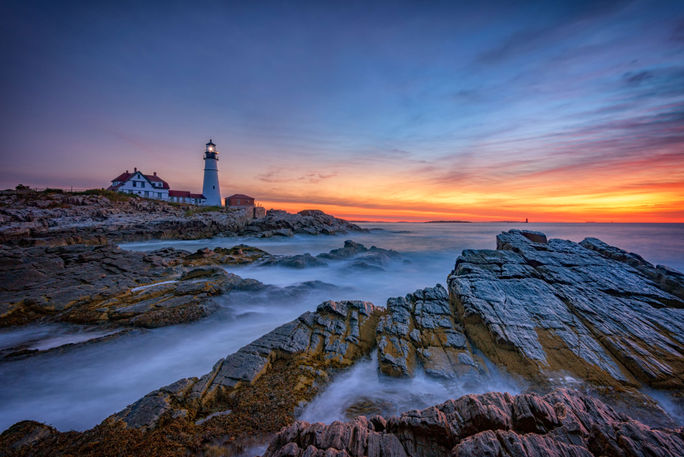 Dawn at Portland Head Lighthouse Portland Head Lighthouse in the pre-dawn light. Portland Head Light is an historic lighthouse in Cape Elizabeth, Maine. The light station sits on a head of land at the entrance of the primary shipping channel into Portland Harbor, which is within Casco Ba