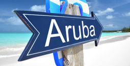 Aruba sign on the beach (Photo via Pincasso / iStock / Getty Images Plus)