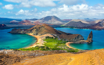 View of two beaches on Bartolome Island in the Galapagos Islands in Ecuador (photo via DC_Columbia/iStock/Getty Images Plus)