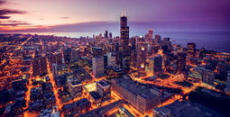 Chicago skyline aerial view at dusk, United States (Photo via  marchello74 / iStock / Getty Images Plus)