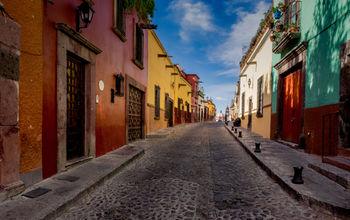The many backstreets of San Miguel de Allende in Mexico can be quiet, colorful and beautifully preserved. A wonderful serene place for a morning or evening walk. (photo via thupton / iStock / Getty Images Plus)
