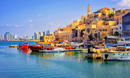 Old town and port of Jaffa and modern skyline of Tel Aviv city, Israel (photo via Xantana / iStock / Getty Images Plus)