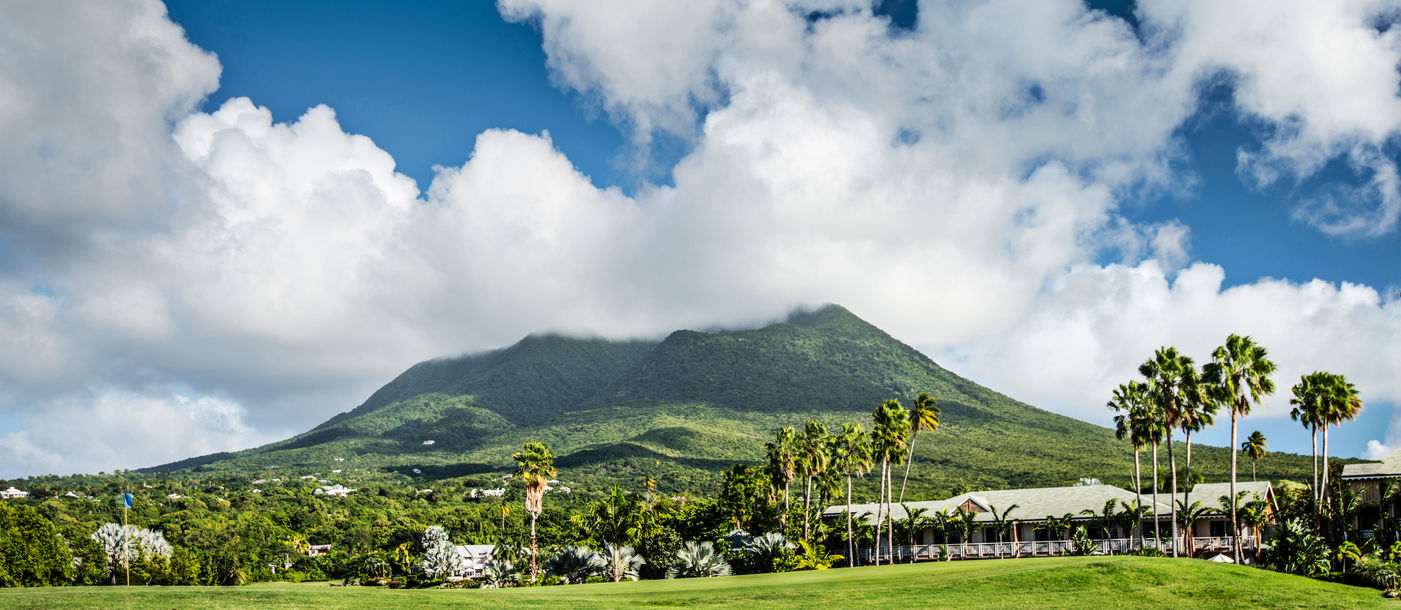 Nevis Peak, a volcano in the Caribbean. (photo via SeanPavonePhoto / iStock / Getty Images Plus)