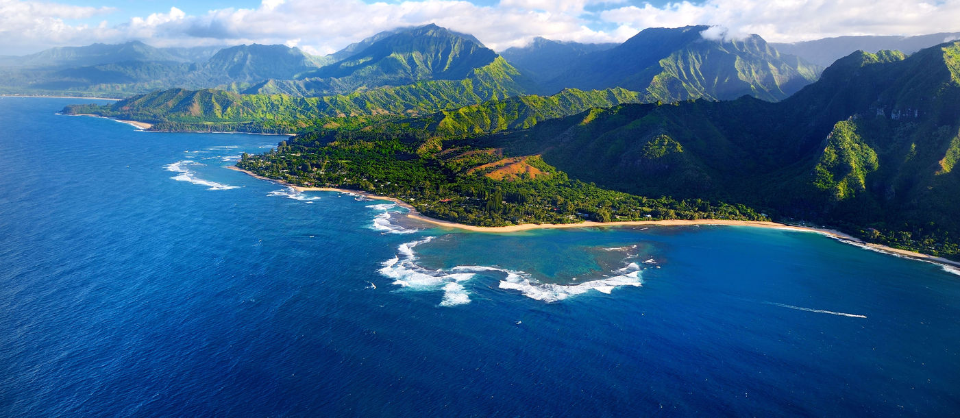 Beautiful aerial view of spectacular Na Pali coast, Kauai, Hawaii (maximkabb / iStock / Getty Images Plus)