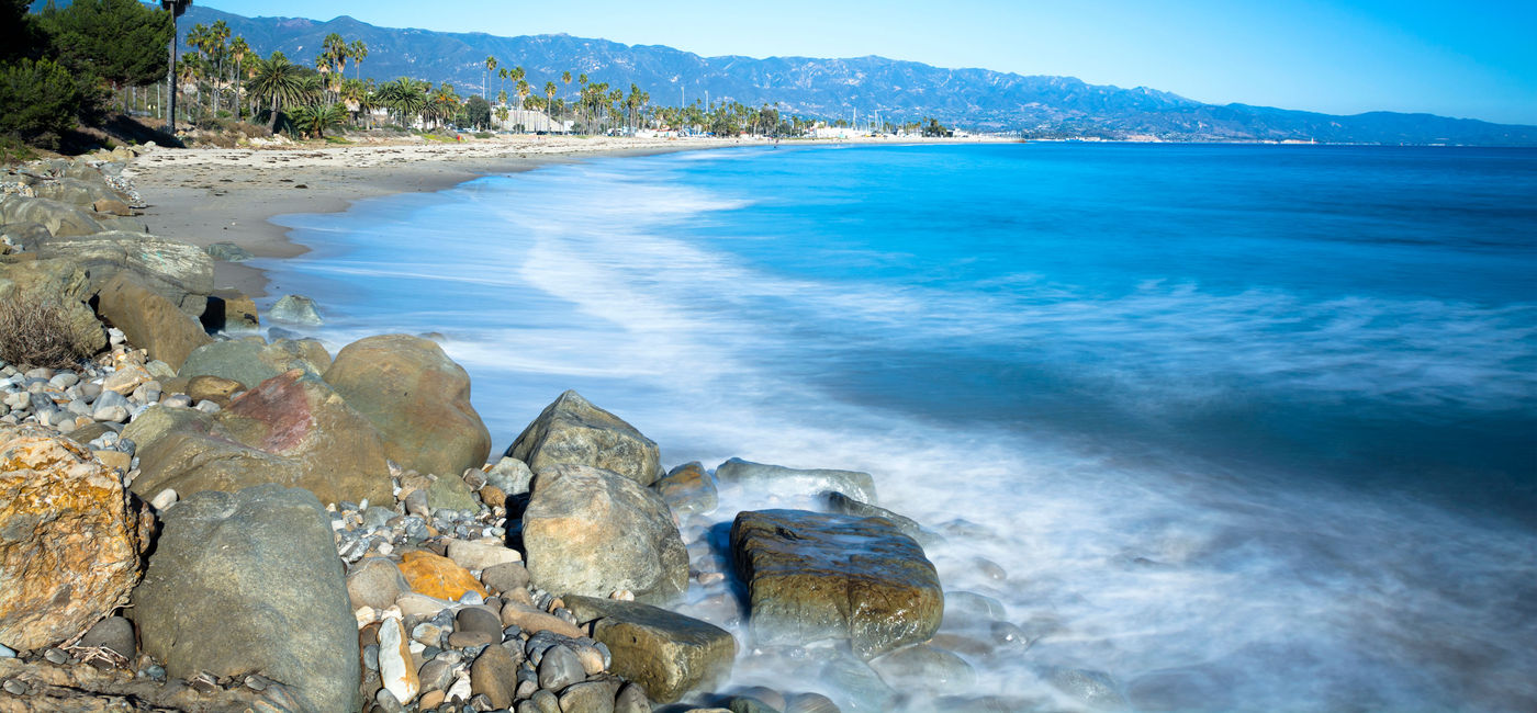 Image: A sandy and rocky beach in Santa Barbara, California. (photo via joebelanger / iStock / Getty Images Plus)