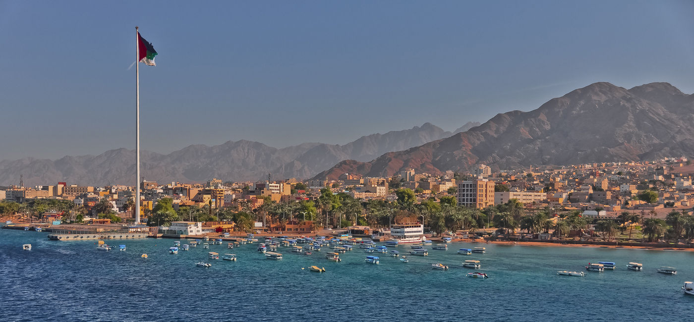 Image: PHOTO: View of the city of Aqaba, Jordan on a windy day. (Photo via BethWolff43 / iStock / Getty Images Plus)