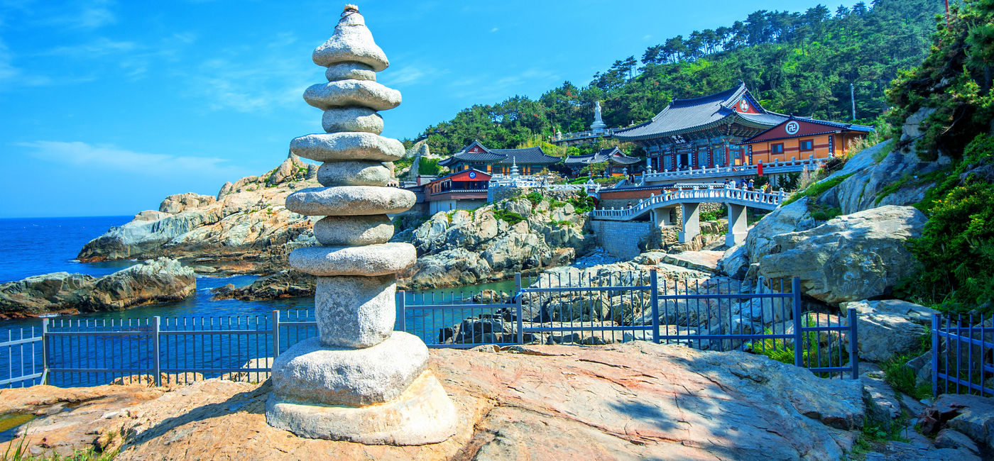 Image: Haedong Yonggungsa Temple and Haeundae Sea in Busan, Korea (Photo via tawatchaiprakobkit / iStock / Getty Images Plus)