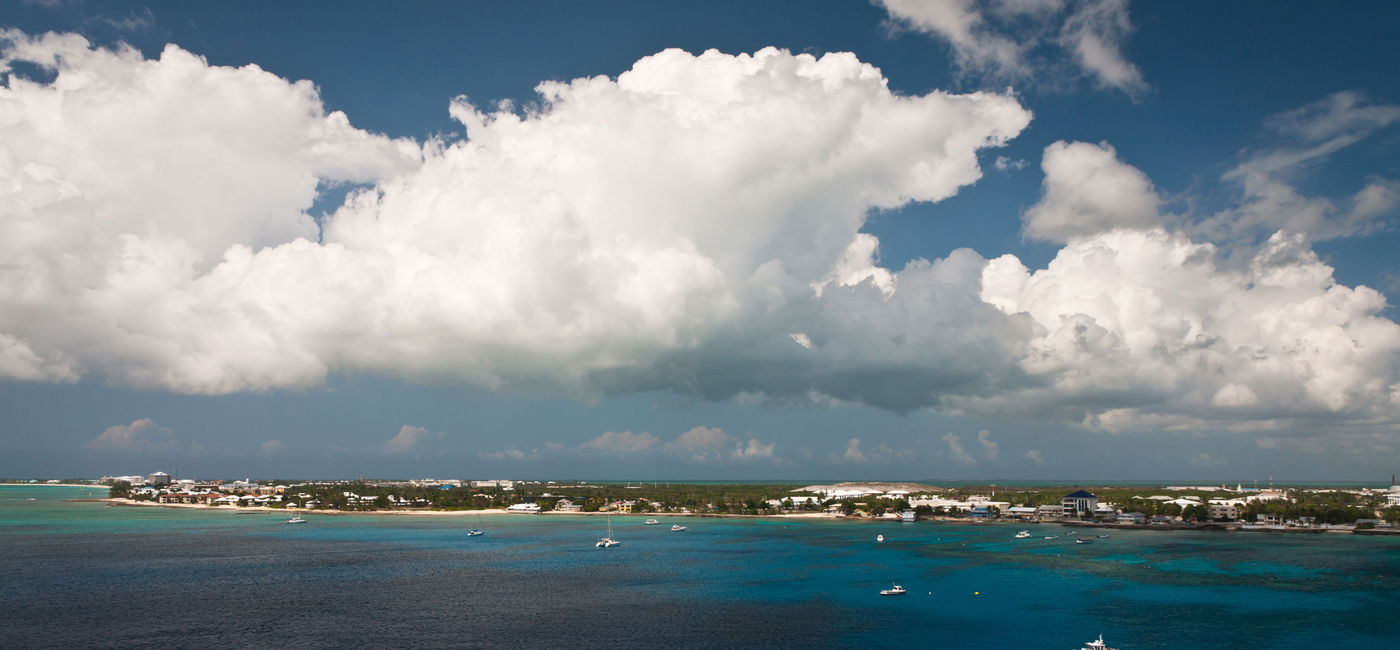 Image: Aerial view of a coastline of Grand Cayman, Cayman Islands. (photo via unclegene/iStock/Getty Images Plus)