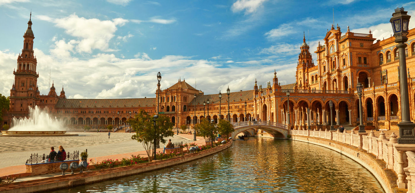 Image: Spain Square (Plaza de Espana). Seville, Spain. (photo via silverjohn / iStock / Getty Images Plus)