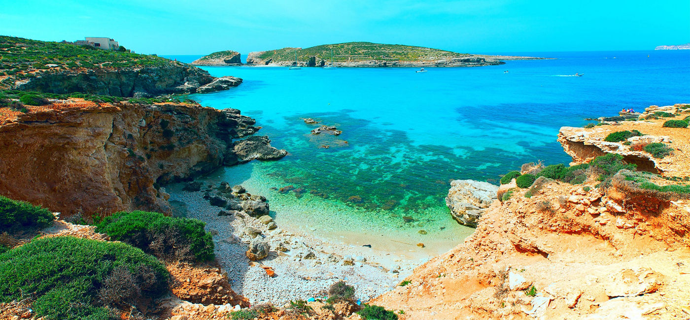 Image: PHOTO: Blue lagoon near Comino island, Malta and Gozo. (photo via luchschen / iStock / Getty Images Plus)