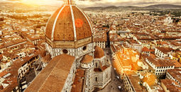 Florence sunny view, Italy. The Basilica di Santa Maria del Fiore (Basilica of Saint Mary of the Flower) in the foreground. (photo via scaliger / iStock / Getty Images Plus)
