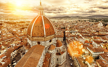 Florence sunny view, Italy. The Basilica di Santa Maria del Fiore (Basilica of Saint Mary of the Flower) in the foreground. (photo via scaliger / iStock / Getty Images Plus)