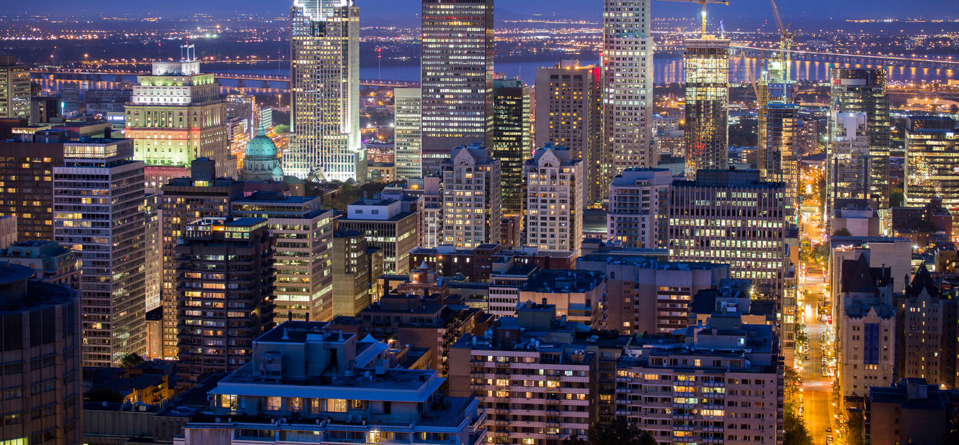 Image: Montreal downtown at dusk (mirceax / iStock / Getty Images Plus)