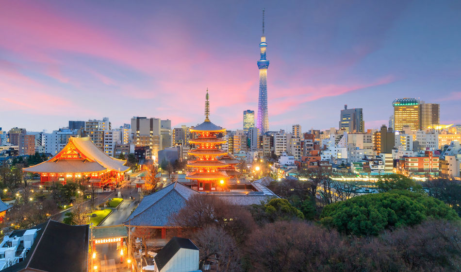 View of Tokyo skyline at sunset in Japan. (photo via f11photo / iStock / Getty Images Plus)