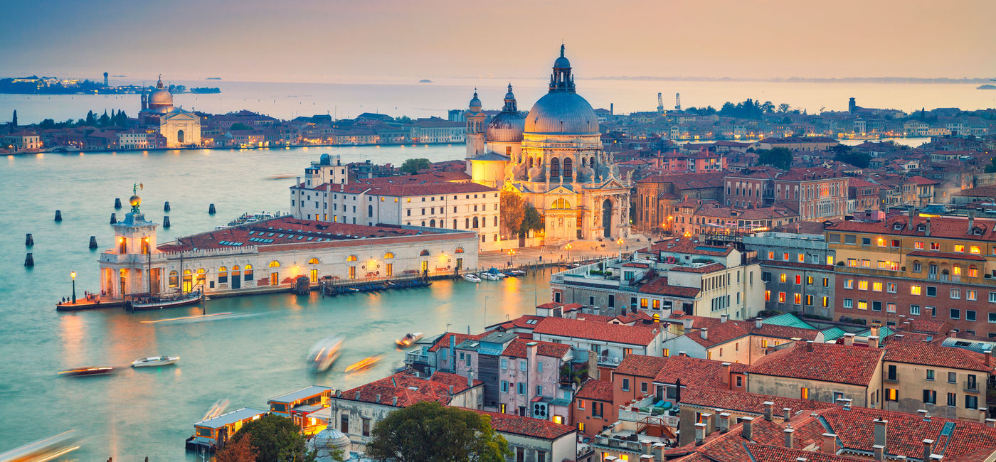 Image: Aerial view of Venice with Basilica di Santa Maria della Salute. (Photo via RudyBalasko / iStock / Getty Images Plus)