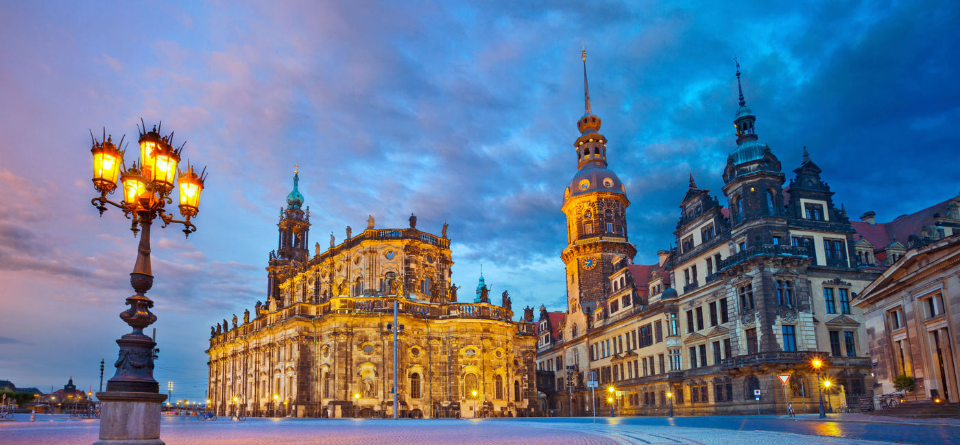 Image: Image of Dresden, Germany during twilight blue hour. (photo via RudyBalasko / iStock / Getty Images Plus)