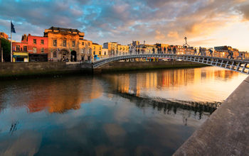 Sunset in Dublin, Ireland (photo via yktr / iStock / Getty Images Plus)