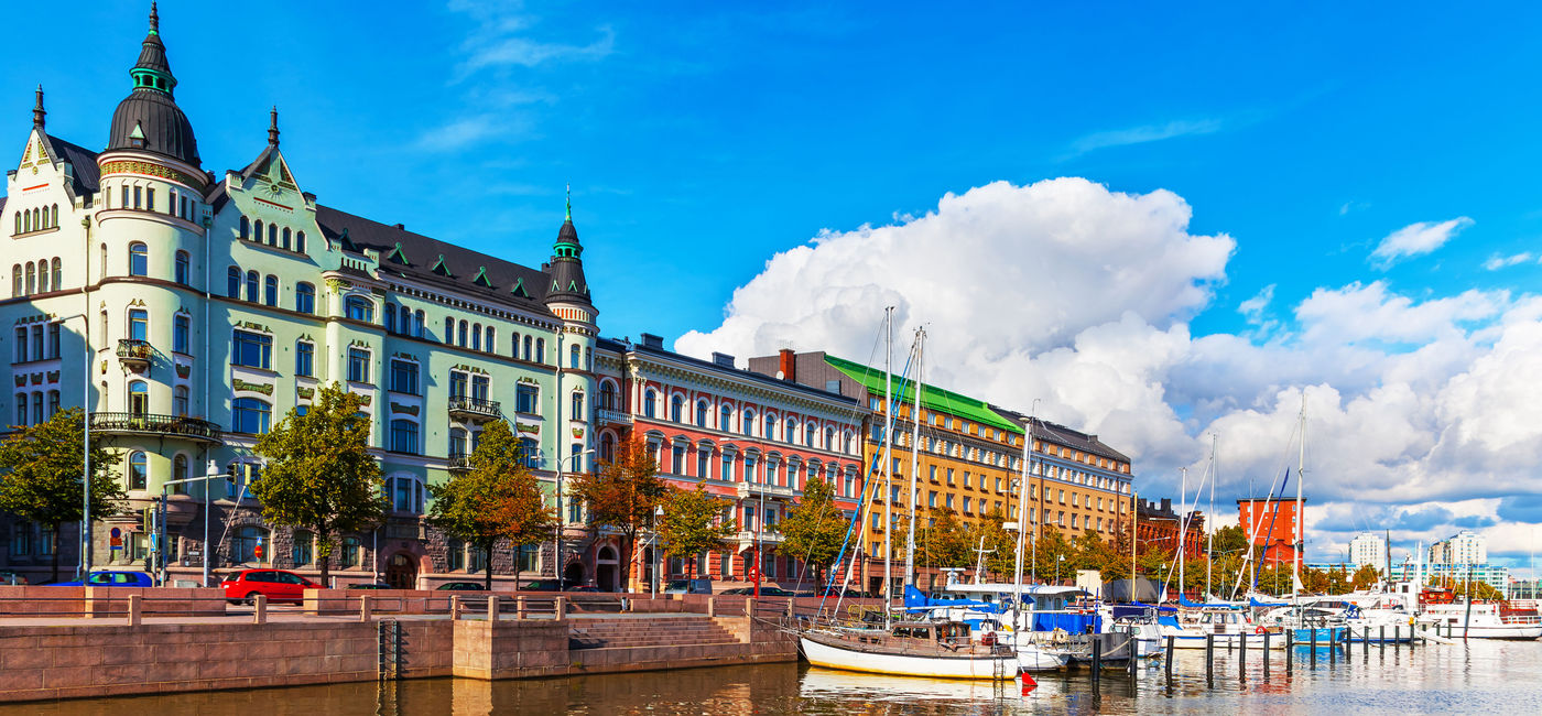 Image: PHOTO: Scenic summer view of the Old Port pier architecture with ships, yachts and other boats in the Old Town of Helsinki, Finland. (photo via scanrail / iStock / Getty Images Plus)