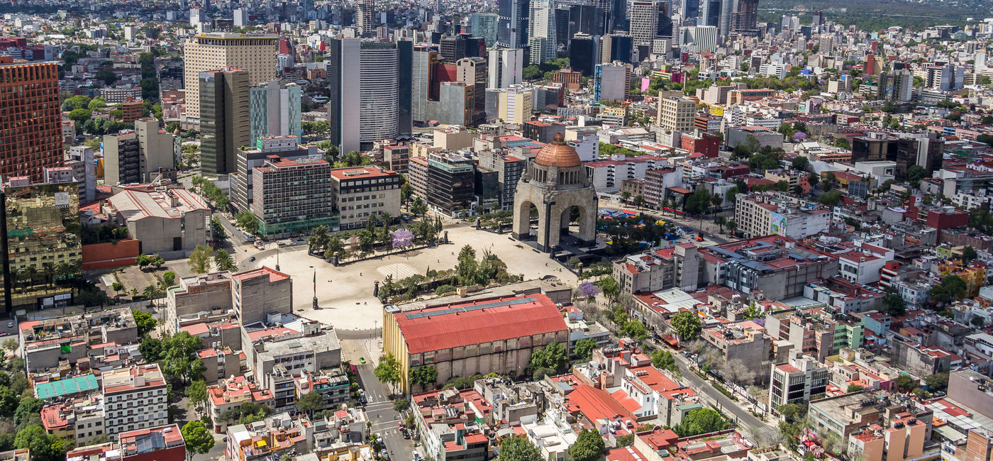 Image: PHOTO: Aerial view of Tabacalera neighborhood and Reforma area, around Monumento a la Revolucion. (photo via UlrikeStein/iStock/Getty Images Plus) (UlrikeStein / iStock / Getty Images Plus)