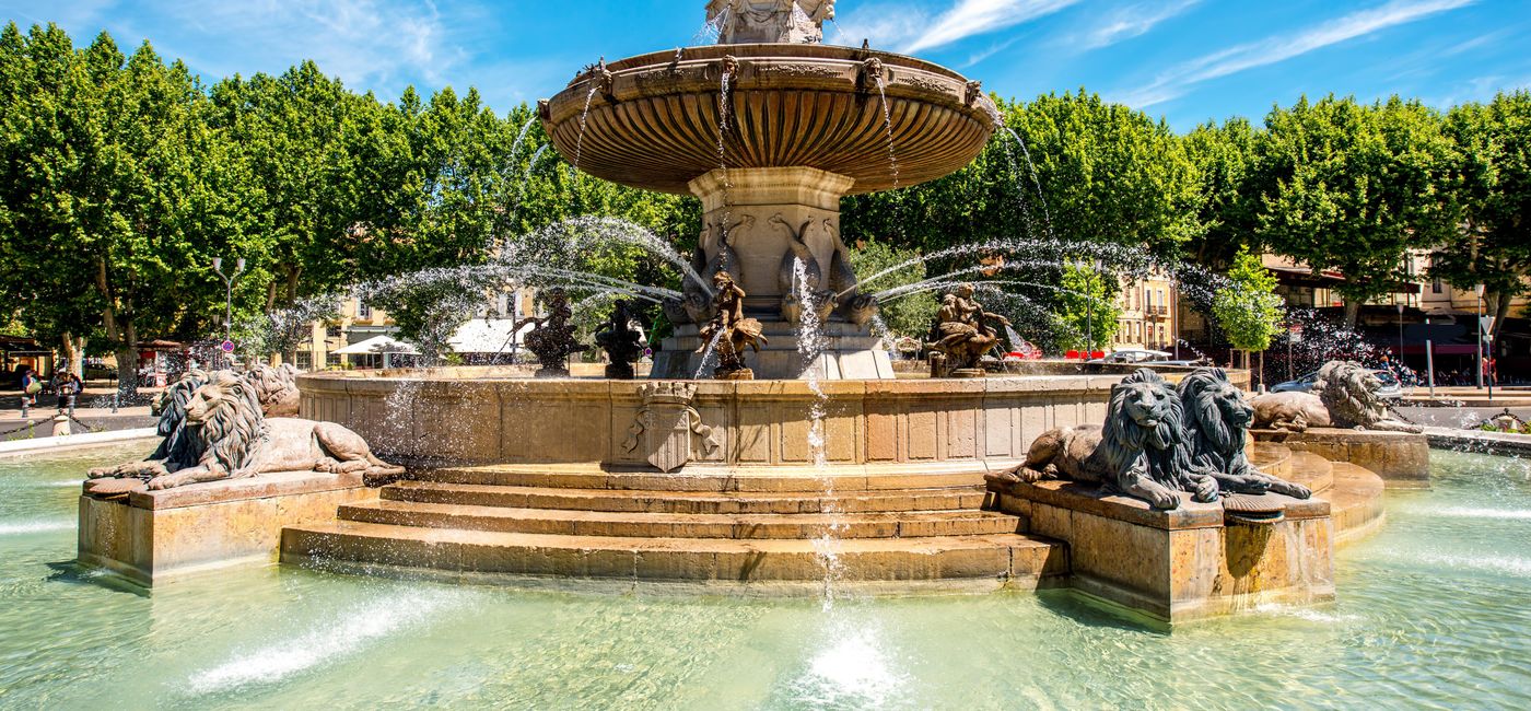 Image: The Fontain de la Rotonde with three sculptures of female figures presenting Justice in Aix-en-Provence in France (photo via RossHelen/iStock/Getty Images Plus)