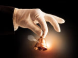 Gloved Hand Bell Hotel RevPAR Recovery