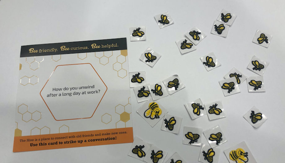 "New Bee" attendee badge patches and coversation cards from the Hive