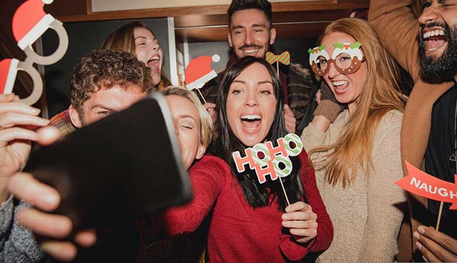 There's no need to pay for a professional photobooth when a handful of props and a smartphone can often be more than enough.