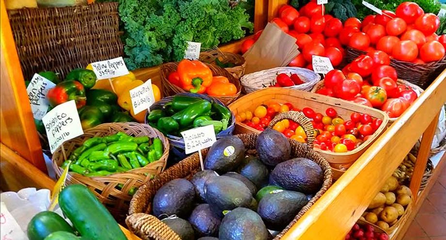 Spending time at a farmer’s market and experience the local tastes is an effective way to find ways to connect an event's menu with local dishes, inexpensively.