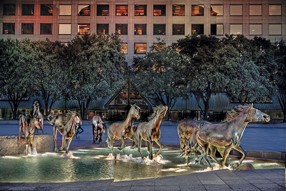 Mustangs at Las Colinas by sculptor Robert Glen graces the Williams Square complex in Irving, Texas.