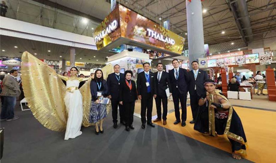 Thailand's Deputy Prime Minister Anutin Charnvirakul (centre) with other dignitaries at Thailand's stand at IBTM World in Barcelona.