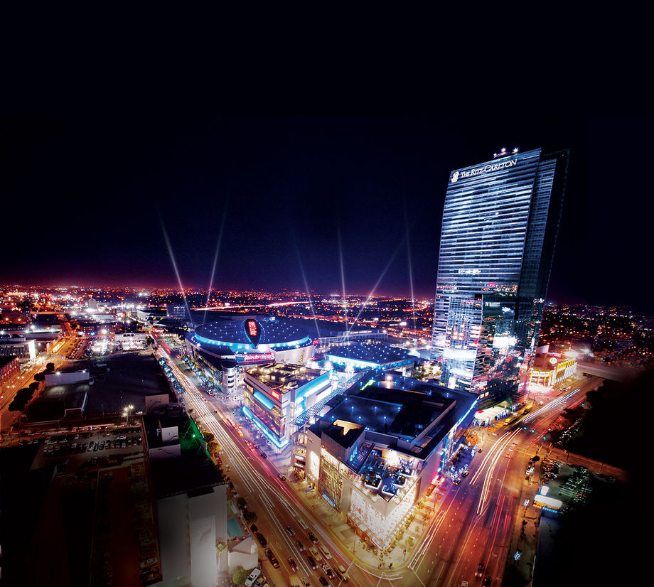 Nighttime photo of the L.A. Live district in Los Angeles, CA