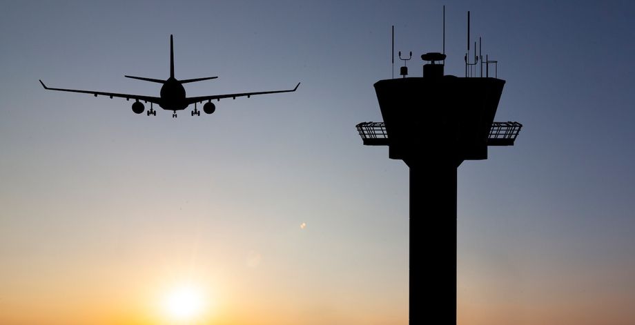 Airport Control Tower and Airplane