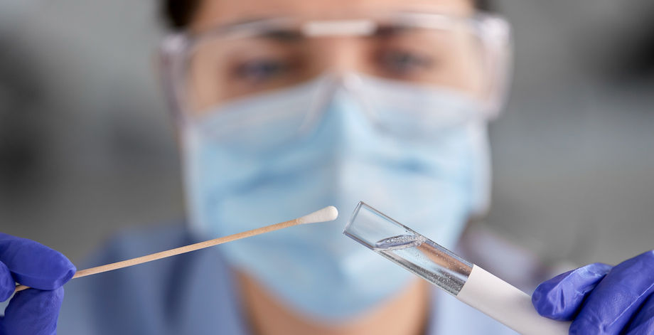 Doctor with Swab Covid Test
