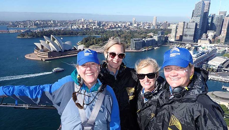 All smiles once you get to the top of the bridge. L-R, Sarah Braley, Jennifer Ludwig, Kelly Whitney and Rebecca Schnitzler