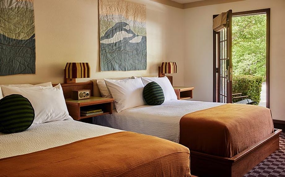 Nature beckons from a guest room at the Trailborn Highlands in North Carolina.