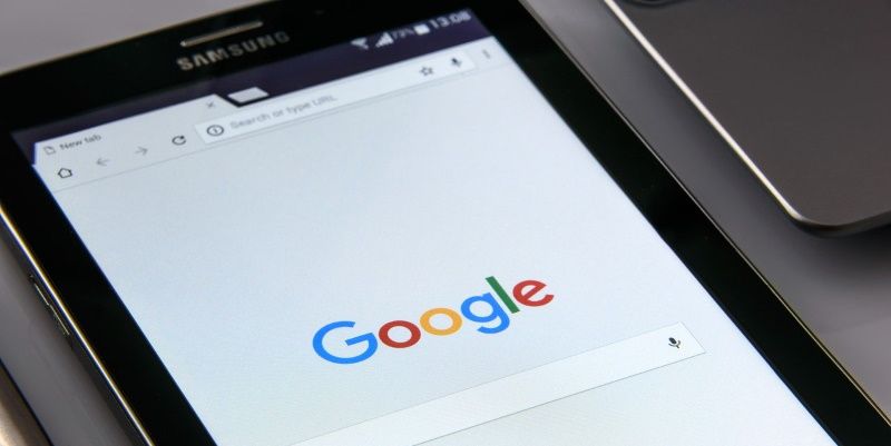 Google takes initial hit from scaling back of travel search ads