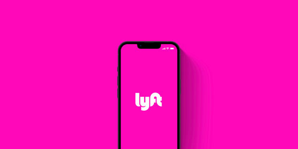 Lyft posts first full year of adjusted EBITDA profitability