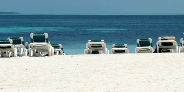 eDigitalResearch: One in three have axed holiday plans in 2009